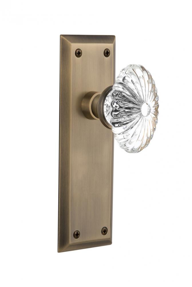 Nostalgic Warehouse New York Plate Privacy Oval Fluted Crystal Glass Door Knob in Antique Brass