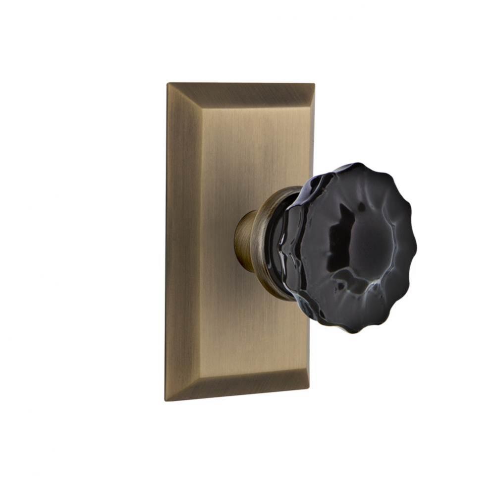 Nostalgic Warehouse Studio Plate Single Dummy Crystal Black Glass Door Knob in Antique Brass