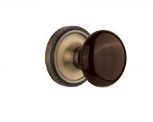 Nostalgic Warehouse 710536 - Nostalgic Warehouse Classic Rosette Single Dummy Brown Porcelain Door Knob in Antique Brass