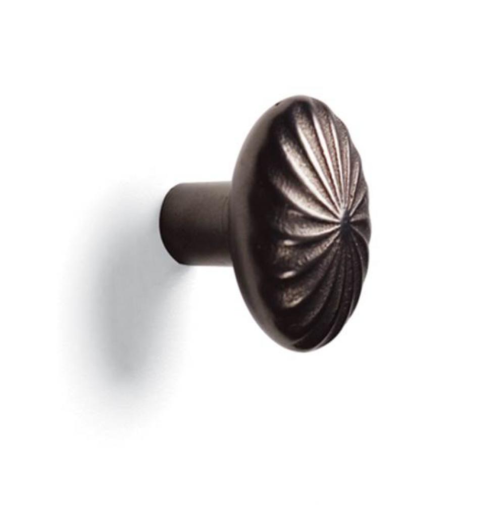 1 1/8'' x 1 9/16'' Giro oval cabinet knob.